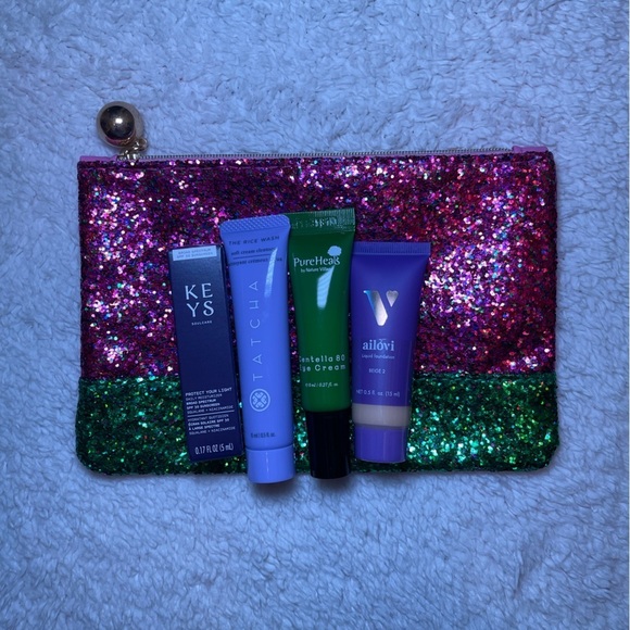 IPSY Bag with Four Sample Size Products - Picture 1 of 4